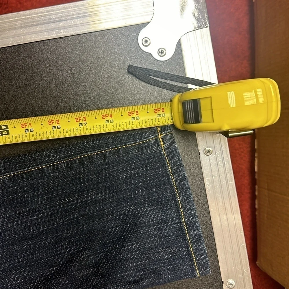94.  Michael Kors dark blue skinny jeans with embellished pockets size 4